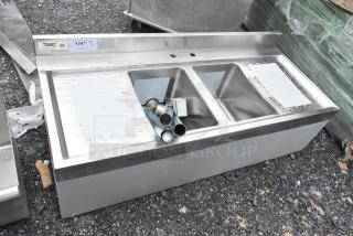 Brand new Regency 600B22148213 underbar sink, 48"x21", two bowls, two 13" drainboards, minor scratches, included fittings.