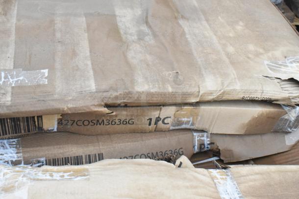Cardboard boxes containing new 427COSM3636G Lancaster Table & Seating Harbor Gray 36" Square Outdoor Tables with scratches and dents.