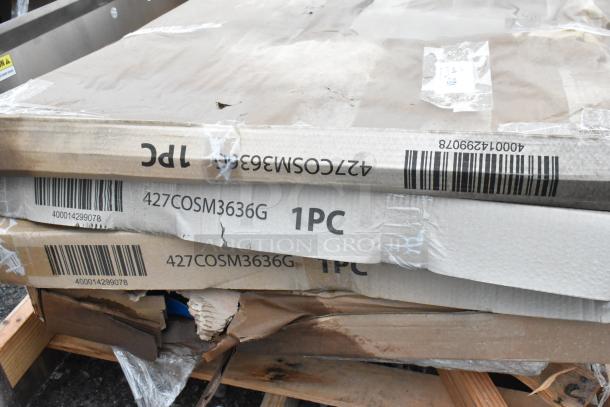 Seven new scratch and dent 427COSM3636G Lancaster tables with ornate legs, visible damage to boxes, standard height, 36" square.