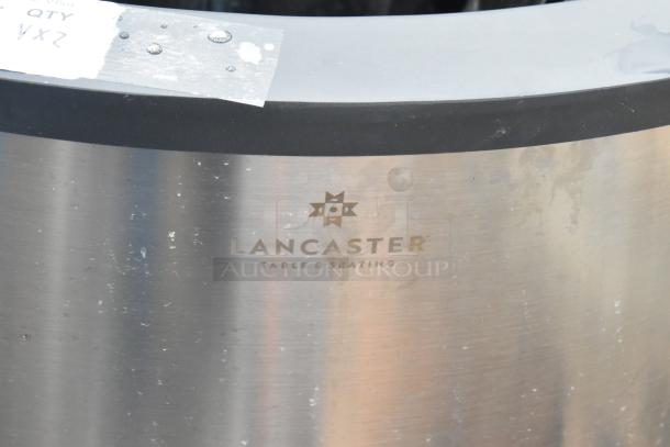 Lancaster stainless steel trash can shell, new scratch and dent condition, 16x16x31, visible brand logo.