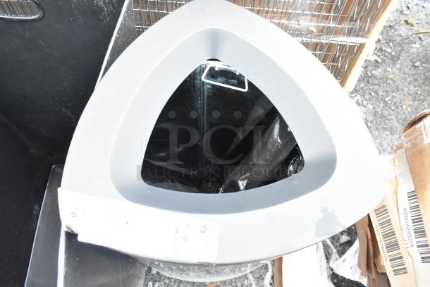 Triangle-shaped trash can and shell, 16x16x31 inches, new with slight scratches, includes labels.