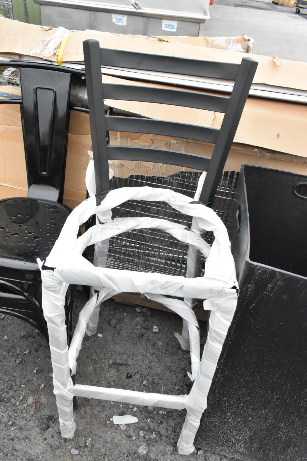 5 brand new scratch and dent chairs, including 2 black metal bar height, 2 Tolix style, 1 blue dining height, wrapped.