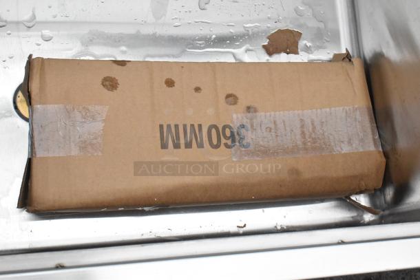 Brand new Regency 600IB1836 18"x36" underbar ice bin. Box displays minor water stains, labeled "360MM."