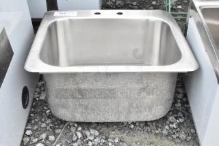 Brand new stainless steel single bay drop-in sink, minor scratches and dents, durable, ideal for kitchens or installations.