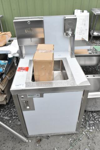 BRAND NEW Regency 600PHS24HC portable hand sink cart, stainless steel, single bowl, hot and cold, minor scratches.