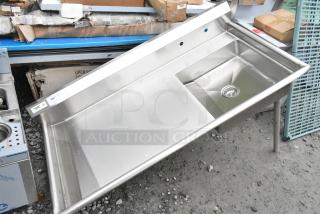 Brand new Regency 600UDT60R stainless steel single bay sink, scratch and dent, missing 2 legs.