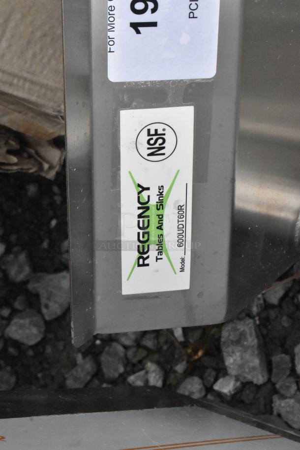 Regency 600UDT60R stainless steel commercial single bay sink, scratch and dent, missing 2 legs, NSF certified label visible.