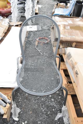 Black mesh metal stackable outdoor patio chair, scratch and dent, brand new, wrapped legs, sturdy design.