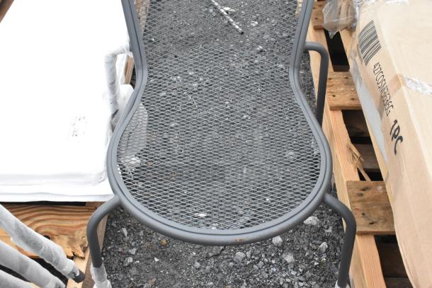 Brand new black mesh metal stackable patio chair with minor scratches. Durable outdoor design. Multipack of 10.