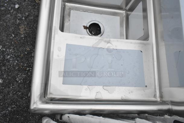 Brand new KoolMore SC121610-12R3 stainless steel kitchen sink, 12x16x10, right 3-compartment, minor scratches visible.