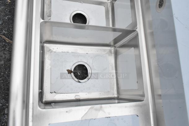 Brand new KoolMore SC121610-12R3 stainless steel 12x16x10 right 3-compartment kitchen sink, slight scratches visible.