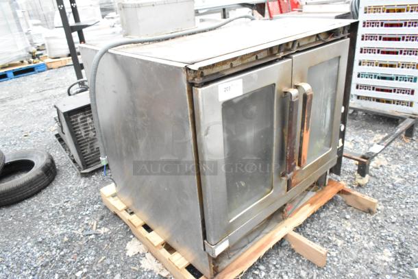 Vulcan Snorkel stainless steel commercial gas convection oven with view-through doors, metal racks, and thermostatic controls.