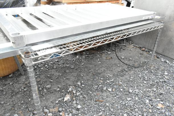 Four metal items including a wire shelf and a dunnage rack; some rust visible; auction offers four times your bid.
