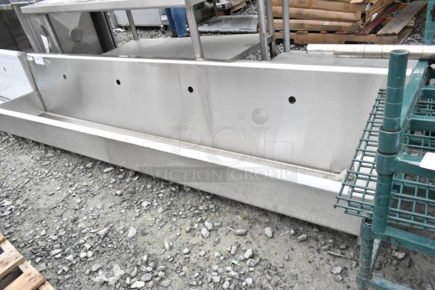 Brand new Regency 600HSMSB1896 96" stainless steel hand sink for 4 single-inlet faucets, scratch and dent condition.