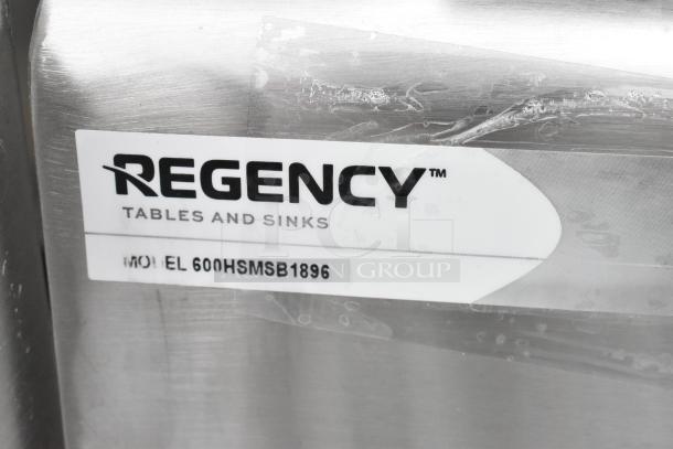 Wall-mounted Regency 600HSMSB1896 hand sink, 96" x 17.5", stainless steel, new scratch and dent, model visible on label.
