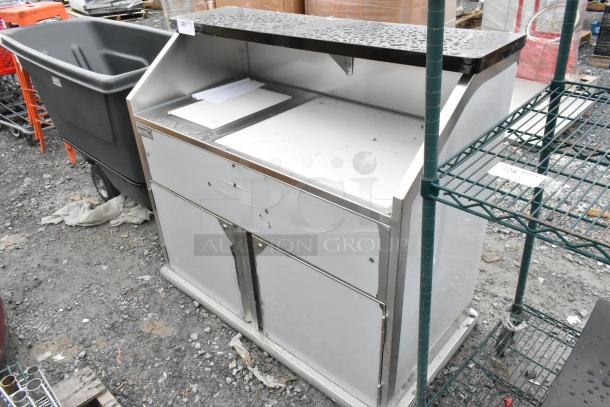 Brand new Regency 600PB48P 48" stainless steel portable bar with elixir station. Features speed rails, cooler, ice bin.