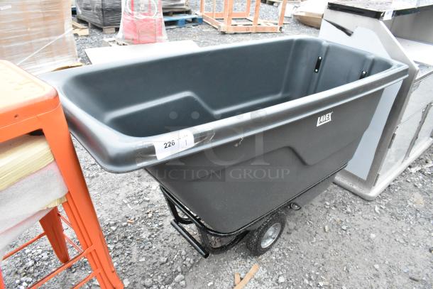 BRAND NEW Lavex 475TT05850GY 0.5 cubic yard gray tilt truck, 850 lb capacity, minor scratches, durable wheels, labeled "226."