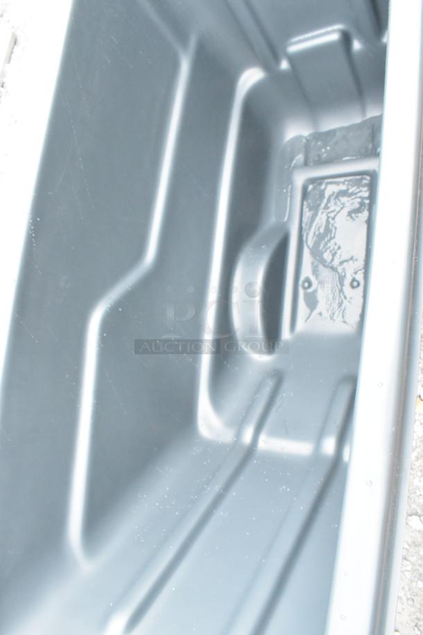 Brand new Lavex 475TT05850GY gray heavy-duty tilt truck; 0.5 cubic yard, 850 lb capacity; slight scratches visible.