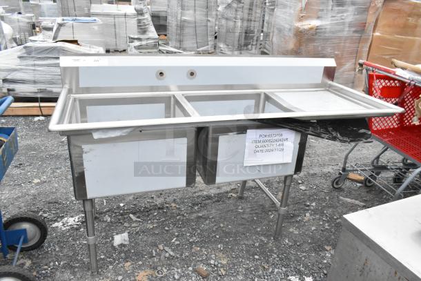 Brand new Regency 600S2242424R stainless steel 2-bay sink with right side drain board, visible label indicates PO#6572708.