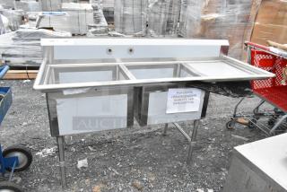 Brand new Regency 600S2242424R stainless steel 2-bay sink with right side drain board, visible label indicates PO#6572708.