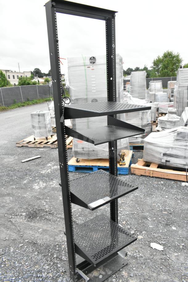 Black metal shelving unit with four perforated shelves, adjustable height, and sturdy frame. Ideal for industrial storage.