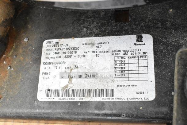 Label on Tecumseh compressor for Mr Winter Walk In Box, model AWA7512ZXDXC, 208-230V, 1-phase, showing specs and charge types.