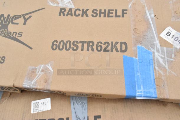 Cardboard box labeled "RACK SHELF 600STR62KD," containing brand new scratch and dent stainless steel overshelves.