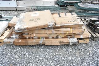 Eight brand new scratch and dent items including stainless steel work table, outdoor white table, wall shelf, in original packaging.