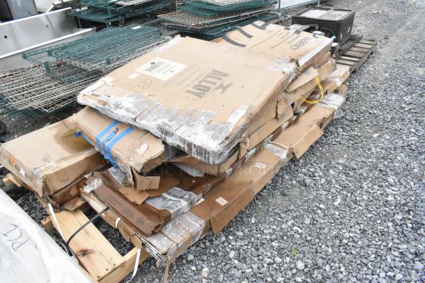 Pallet of 8 new scratch and dent items in damaged boxes, includes stainless steel work table, outdoor table, wall shelf.