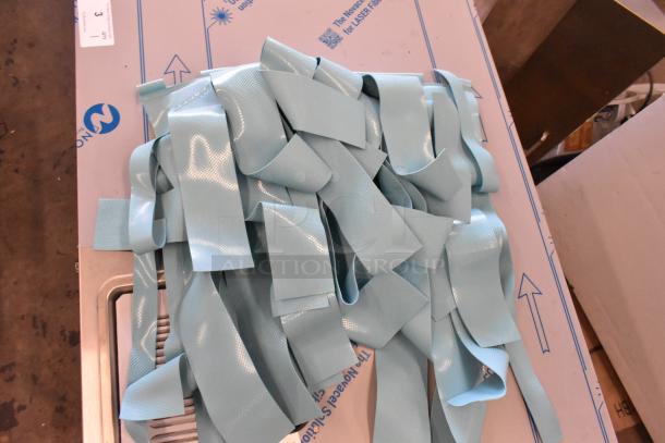 Assure Blue Dishwasher Ribbon Curtain, new, features light blue PVC ribbons, industrial use, in pristine condition.