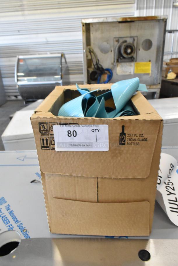 Assure Blue Dishwasher Ribbon Curtain, new condition, in cardboard box labeled "80 QTY."