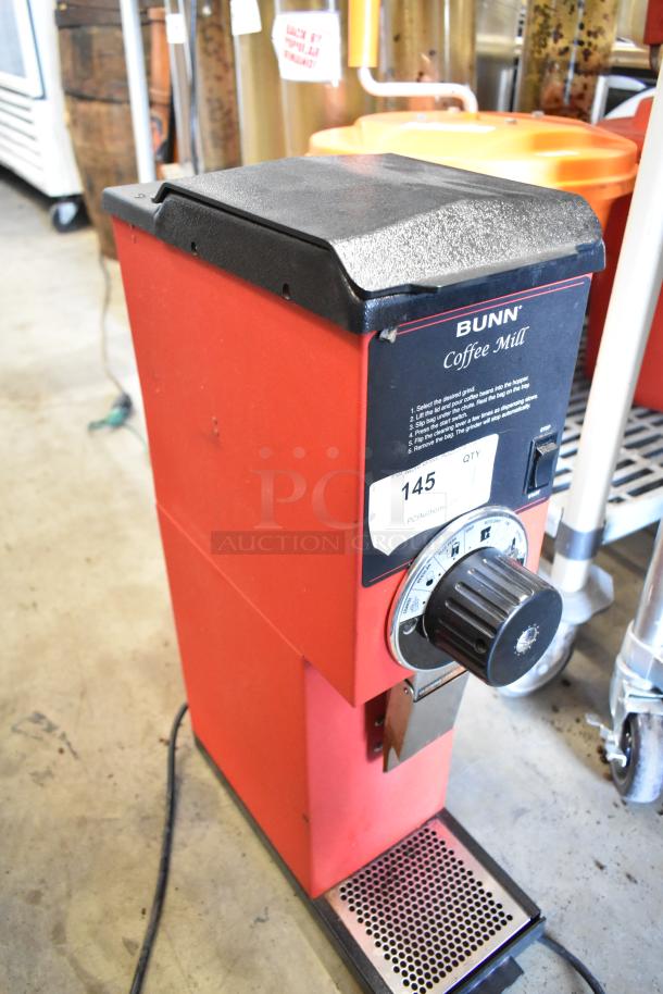 Bunn Metal Commercial Coffee Bean Grinder, red, countertop model, 120V, 1 phase, tested working, visible control dial.