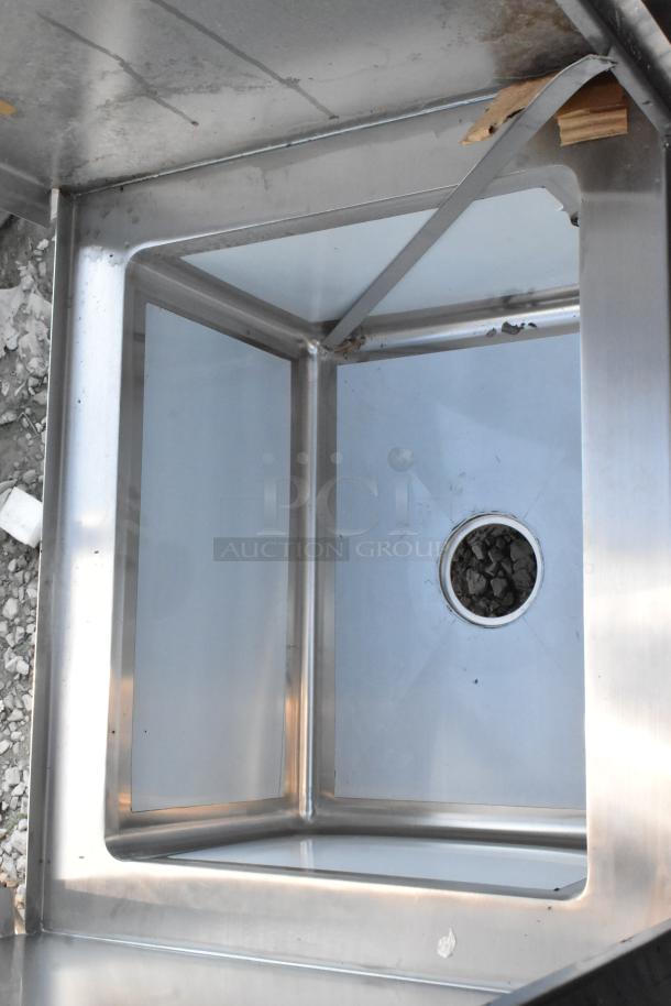 Brand new Advance Tabco 9-OPC-84DR-300 stainless steel cabinet with mop sink, visible scratch and dent damage.