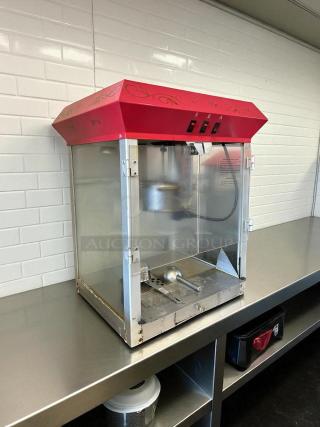 Elite Deluxe EPM-400 popcorn popper, 8-oz capacity, in good condition. Features red top, tested and working. Model label visible.