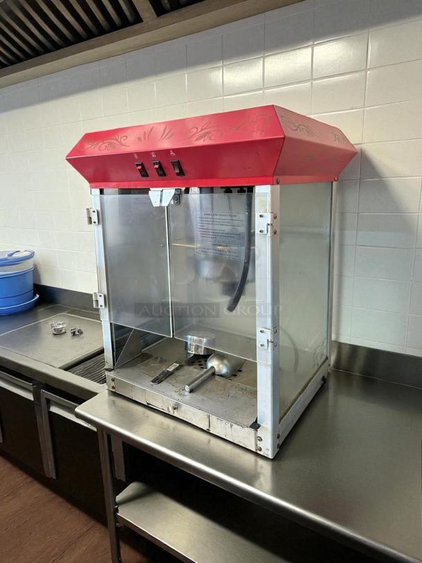 Elite Deluxe EPM-400 popcorn popper, 8-oz capacity, red top, glass doors, tested and working, good condition, 115v.