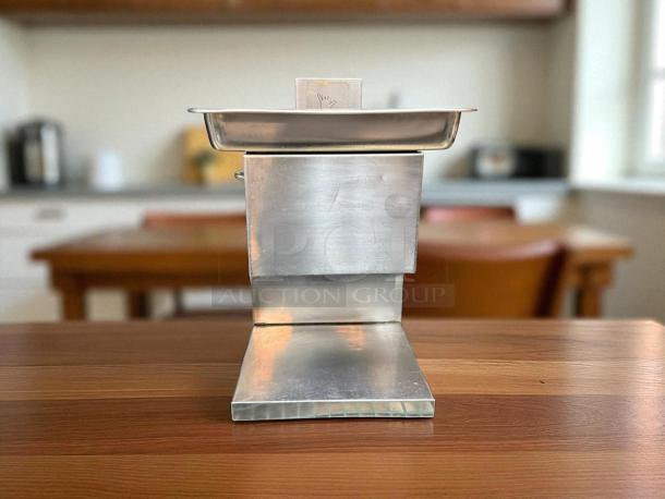 Countertop 115v meat grinder, 12"W x 16"D x 15"H, great condition, fully tested, stainless steel finish.