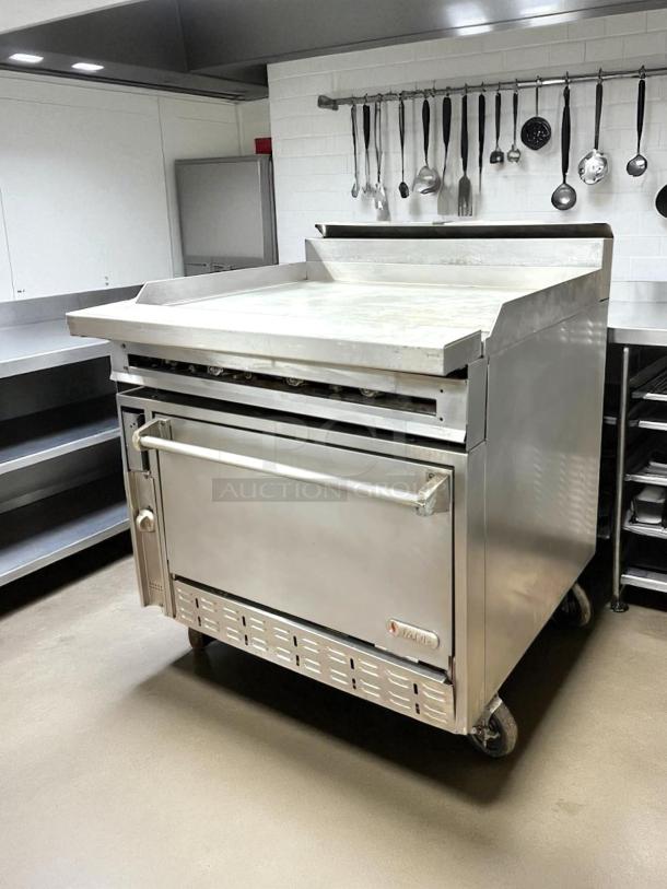 Jade JTRH-36G-36C gas range, 36" full griddle, convection oven, stainless steel, on casters, 135,000 BTU, tested, working.