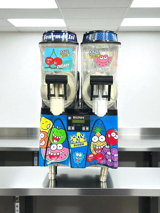Bunn 58000.0016 Double 3-Gallon Slushy Machine, tested and working, colorful Jolly Rancher graphics, visible flavor labels.