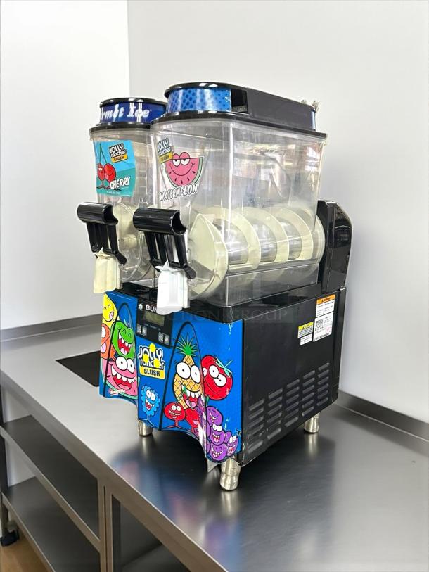 Bunn 58000.0016 double 3-gallon frozen beverage machine, tested working. Clear canisters with Jolly Rancher graphics.