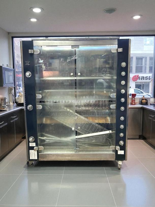 Rotisol USA FB1400-8G-SS gas rotisserie, 8 spit, 48 bird capacity, natural gas, great condition, tested & working.