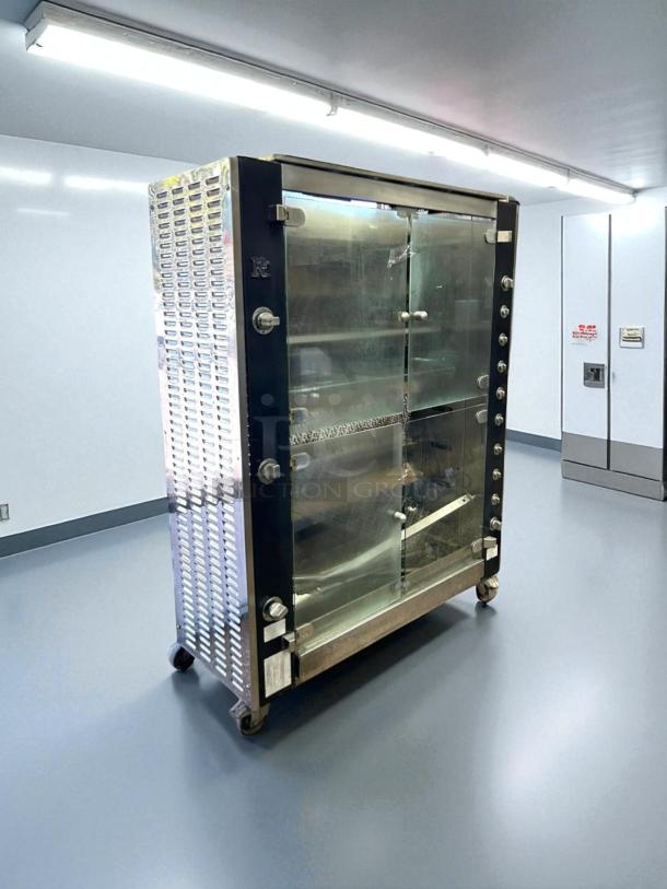 Rotisol USA FB1400-8G-SS gas rotisserie, 8 spit, 48 bird capacity, stainless steel, great condition, tested and working.