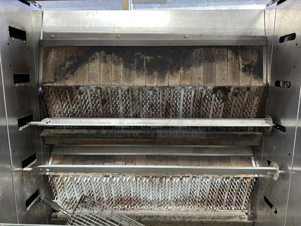 Rotisol USA FB1400-8G-SS gas rotisserie, 8 spits, 48 bird capacity, natural gas, great condition, tested and working.