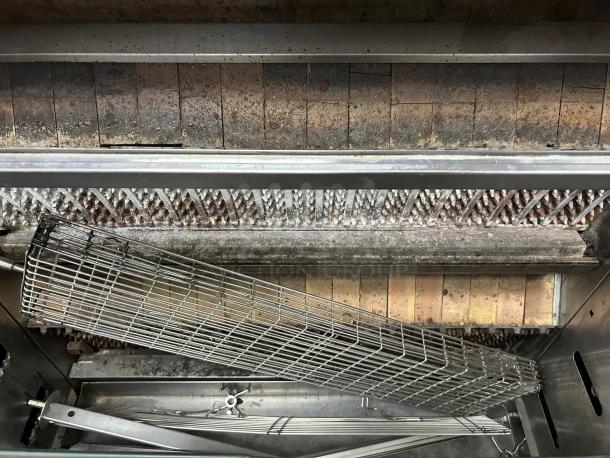 Rotisol USA FB1400-8G-SS rotisserie, gas-powered, 8 spit, holds 48 birds, natural gas, tested and working, great condition.