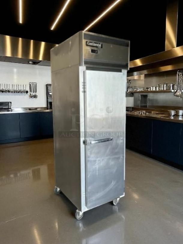 Continental 1FNSS Freezer, one-section reach-in, stainless steel, excellent condition, fully tested, with casters.