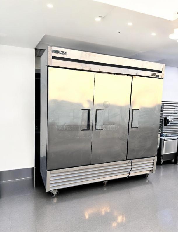 True T-72F-HC 3-Door Commercial Freezer in outstanding condition, 72 cu. ft., fully tested, stainless steel exterior.