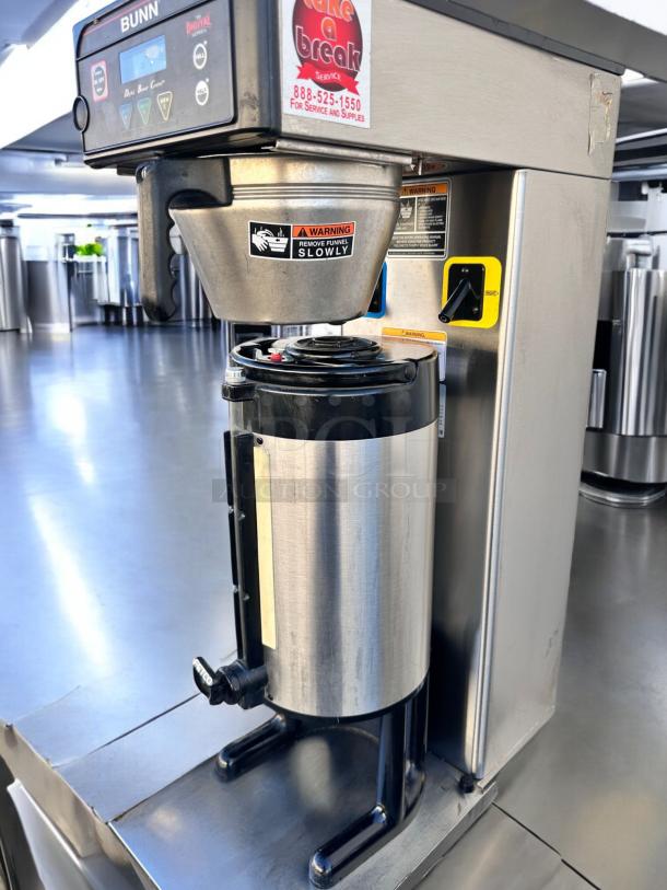 BUNN ITB digital iced tea brewer, 120V DDIL, excellent condition, fully tested. Features warning labels and control panel.