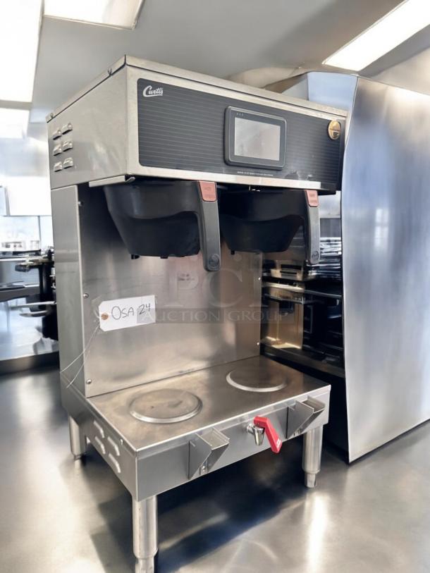 Curtis G4GEMT10A1000 Twin Coffee Brewer, dual warmers, great condition, fully tested, stainless steel build, red faucet handle.