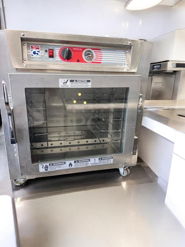 Outstanding condition Metro C5 Heated Holding Cabinet, model C5 63L-SFC-UA, fully tested, with visible temperature controls and caution labels.