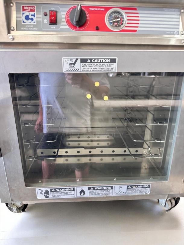 Metro C5 Heated Holding Cabinet, Model C5 63L-SFC-UA, outstanding condition, tested & working, caution labels visible.