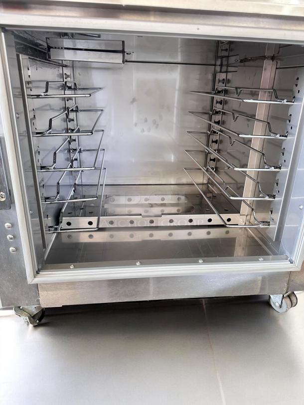 Metro C5 63L-SFC-UA Heated Holding Cabinet in outstanding condition, fully tested, stainless steel interior, on wheels.